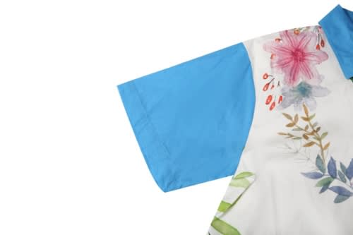 A beach shirt featuring a floral design with blue sleeves. It has vibrant colours and botanical patterns.