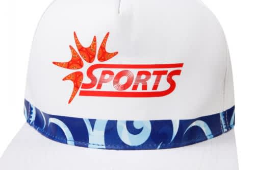 A white sublimated sport cap with a patterned blue band and a logo displayed on the front.