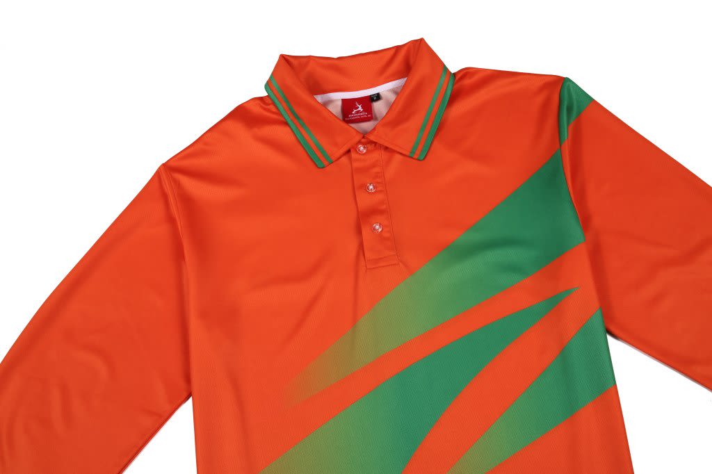 An orange polo shirt featuring green diagonal stripes and a collar. The shirt has a logo on the neckline.