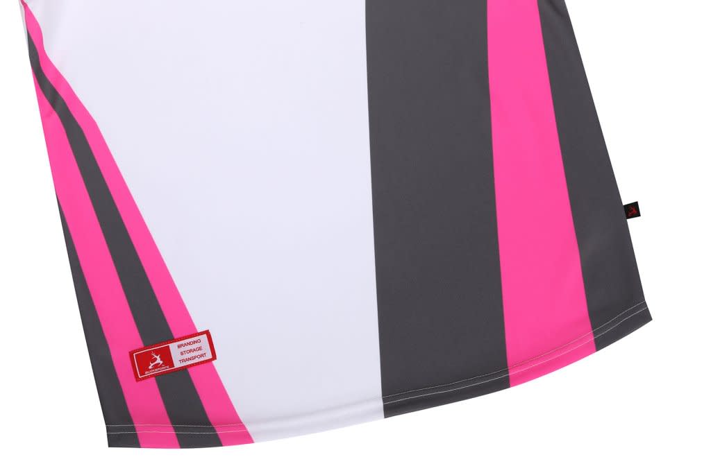 A single AFL singlet featuring pink, grey, and white stripes, with a branding logo on the side.