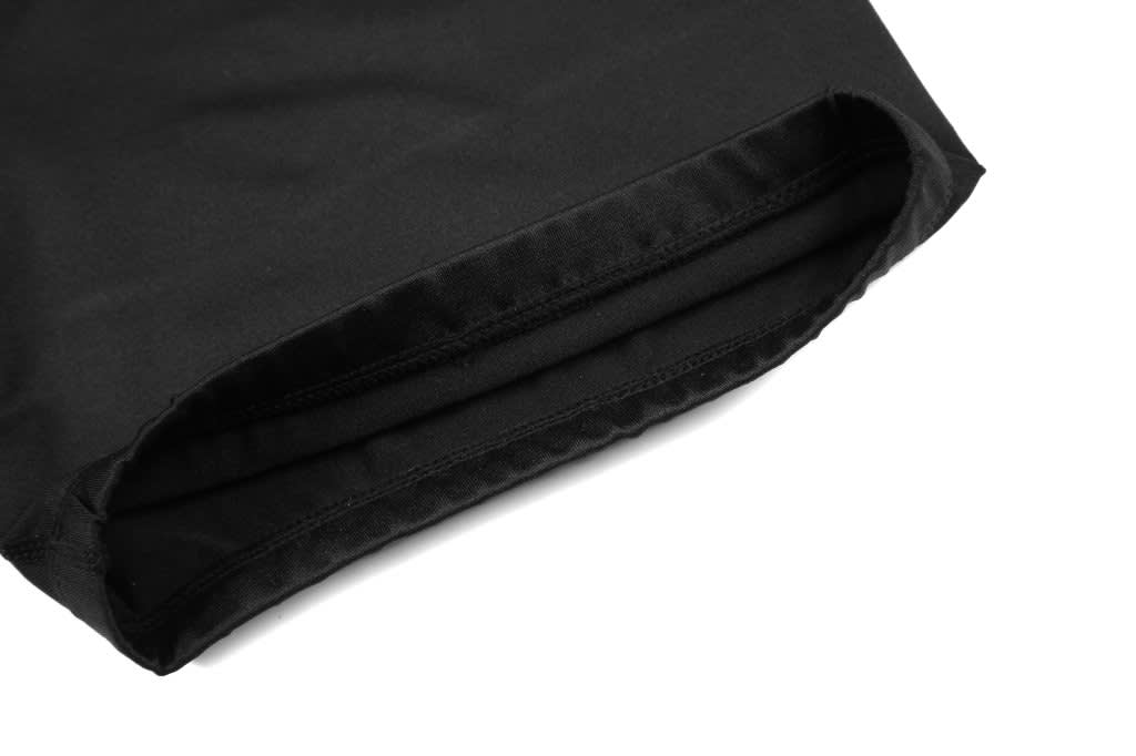 Black anti-slip shorts with a smooth waistband and detailed stitching. The product features a logo.
