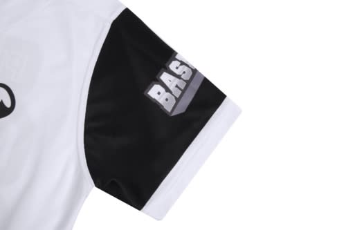 A white and black sports jersey featuring a predominantly white body and black sleeves. The sleeve has a logo.