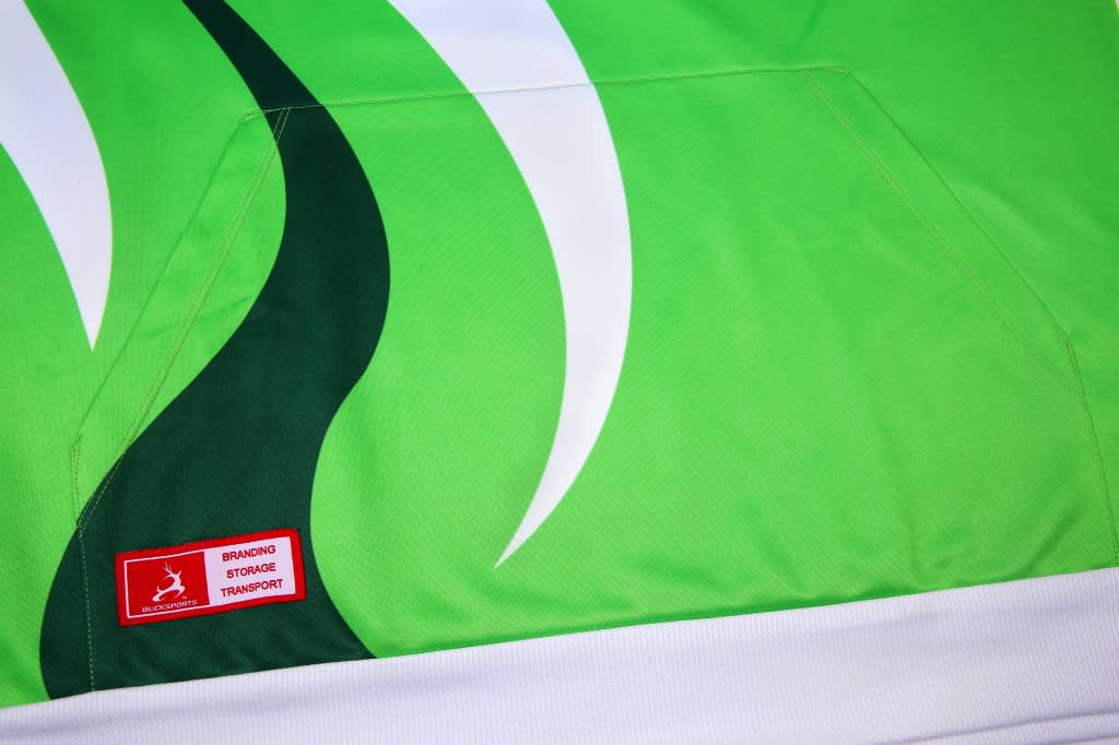 A brightly coloured green athletic hoodie with a white and dark green design and a pocket on the front.