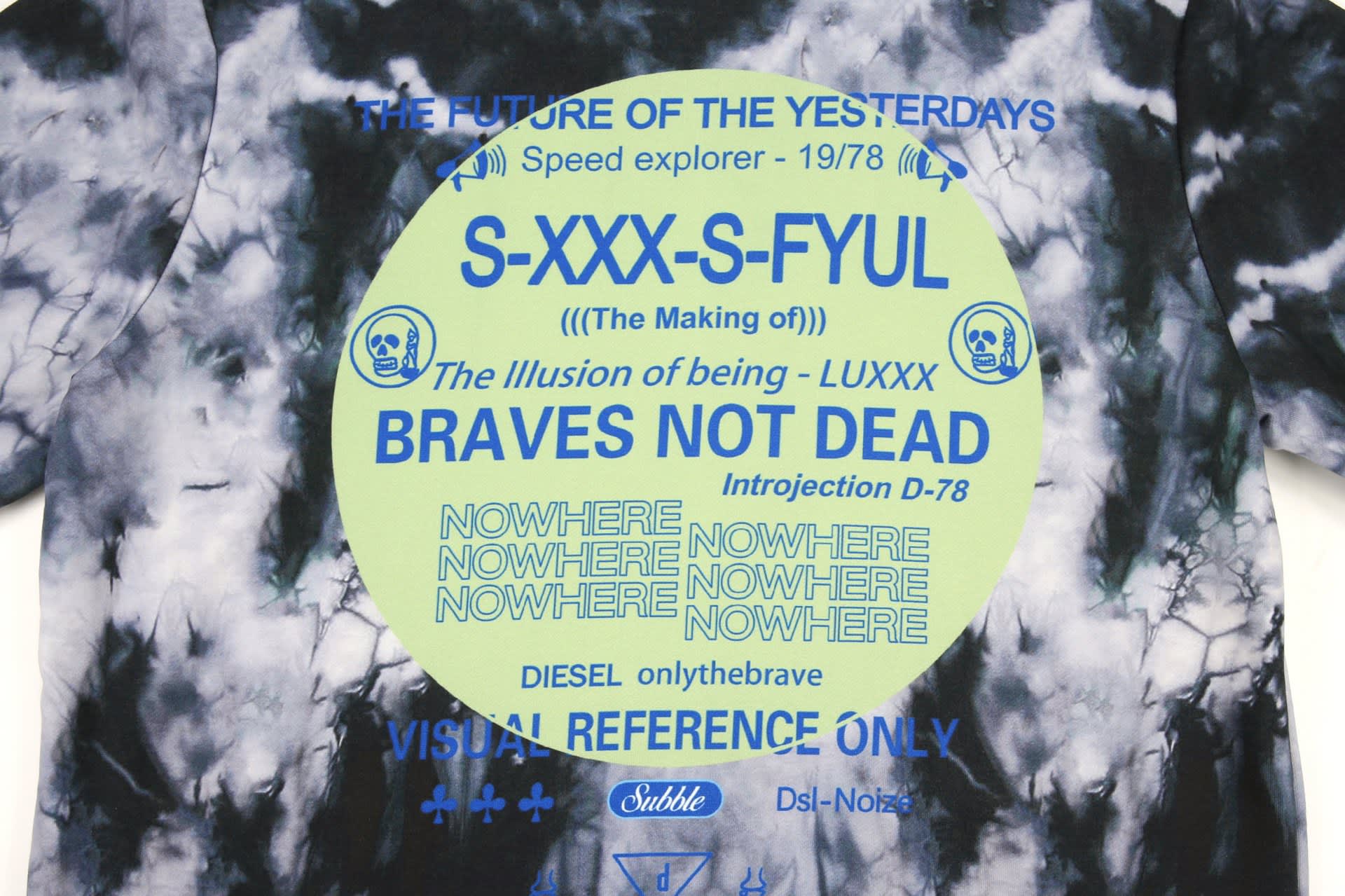 A cotton hoodie with a tie-dye pattern in black and grey, featuring a large green circular graphic and text elements.