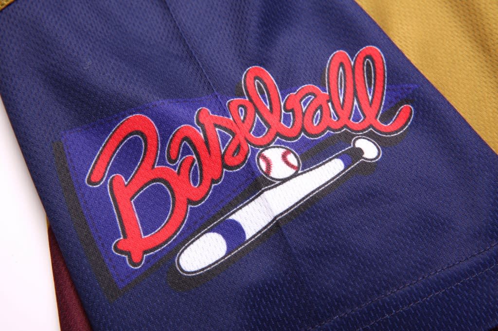 A baseball-themed promotional product featuring a vibrant design with red, blue, and yellow colours, and a logo.