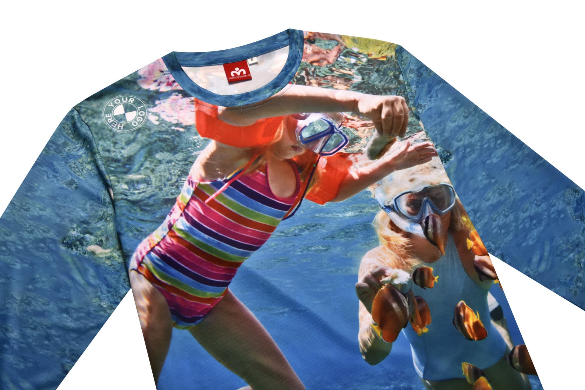 A long-sleeved T-shirt featuring a vibrant underwater scene with two children swimming and colourful fish. It has a logo on the sleeve.