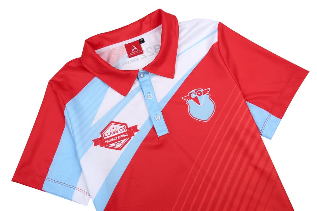 A red and light blue polo shirt featuring a logo and a badge, with a collared neckline and button placket.