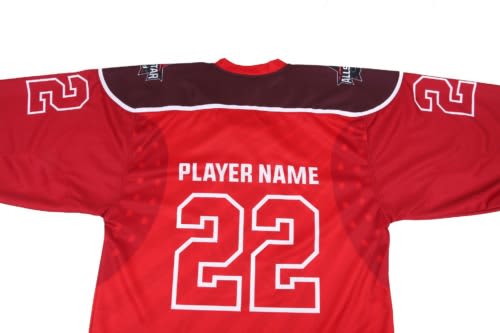 A red hockey jersey featuring a dark collar and a large number '22', along with a logo on the sleeves.