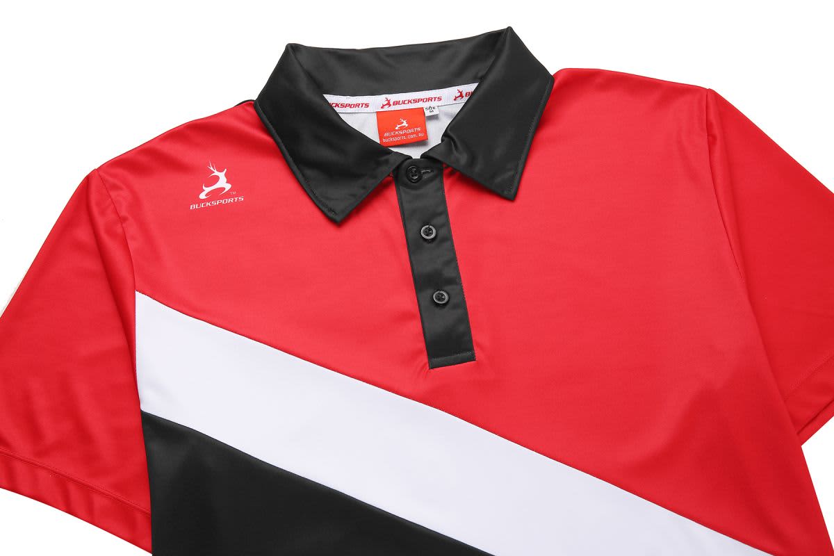 A red, black, and white polo shirt with a collar and buttons, featuring a logo on the chest.