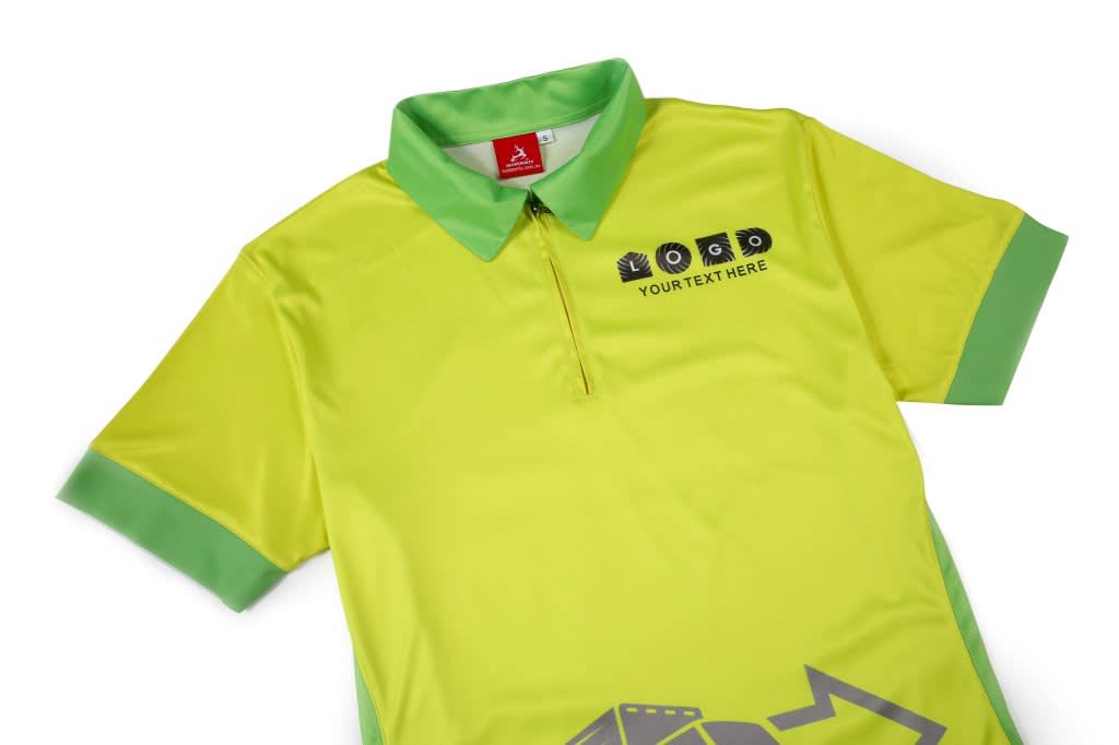 A bright yellow polo shirt with green accents and a logo printed on the front.