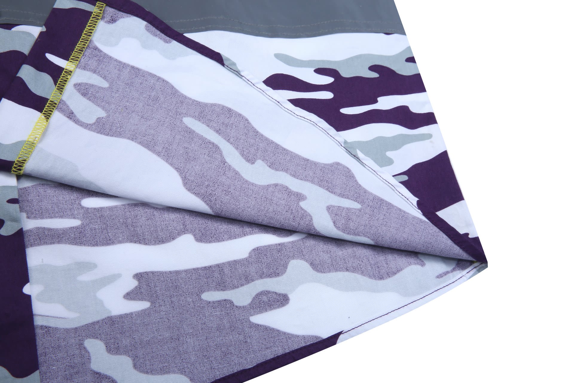 A folded workwear shirt featuring a grey and purple camouflage pattern. It has reflective detailing and a branding logo.