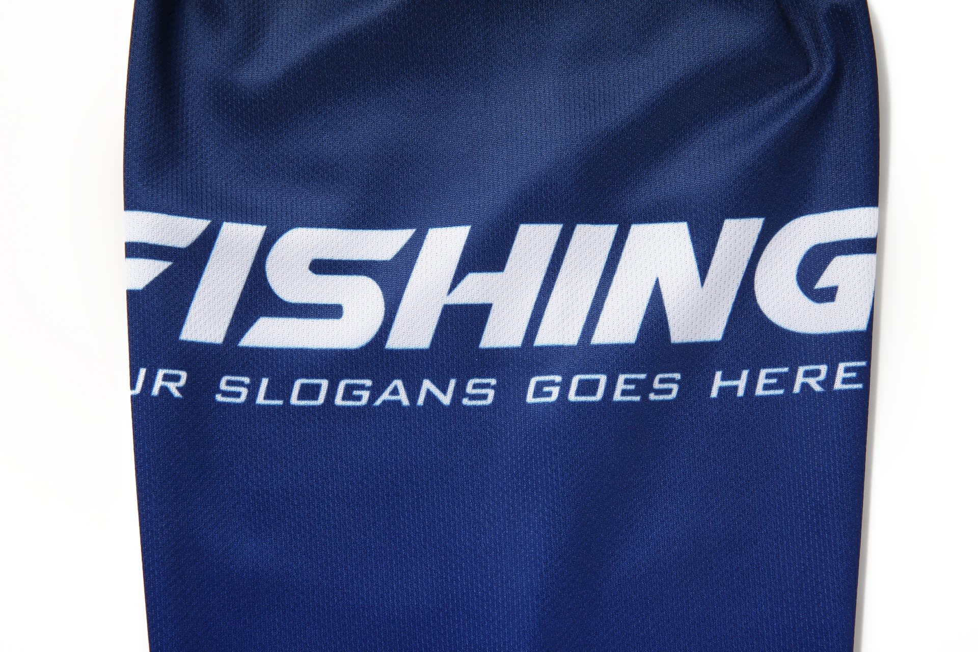 A dark blue jersey featuring the word "FISHING" prominently displayed and a logo on the fabric.