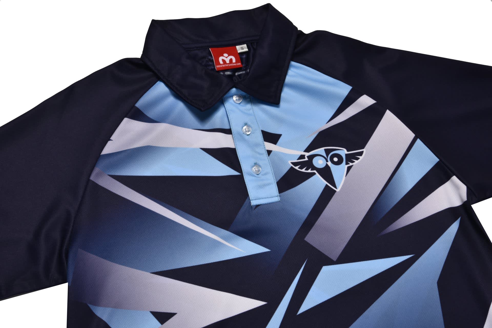 A polo shirt featuring a blue and navy geometric design with a logo on the chest and a collar.