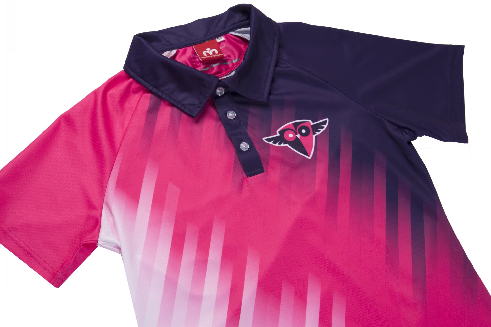 A fabric shirt featuring a gradient design with shades of pink and navy, and a logo on the front.