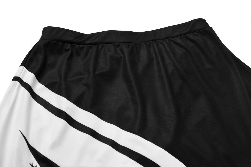 A black and white bowling team uniform with a smooth, sleek design and an elastic waistband.