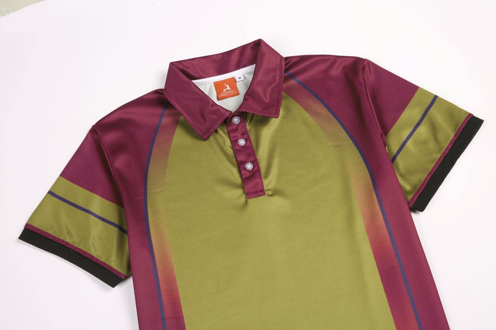 A collared polo in green with maroon accents, featuring a button-down placket and a logo.