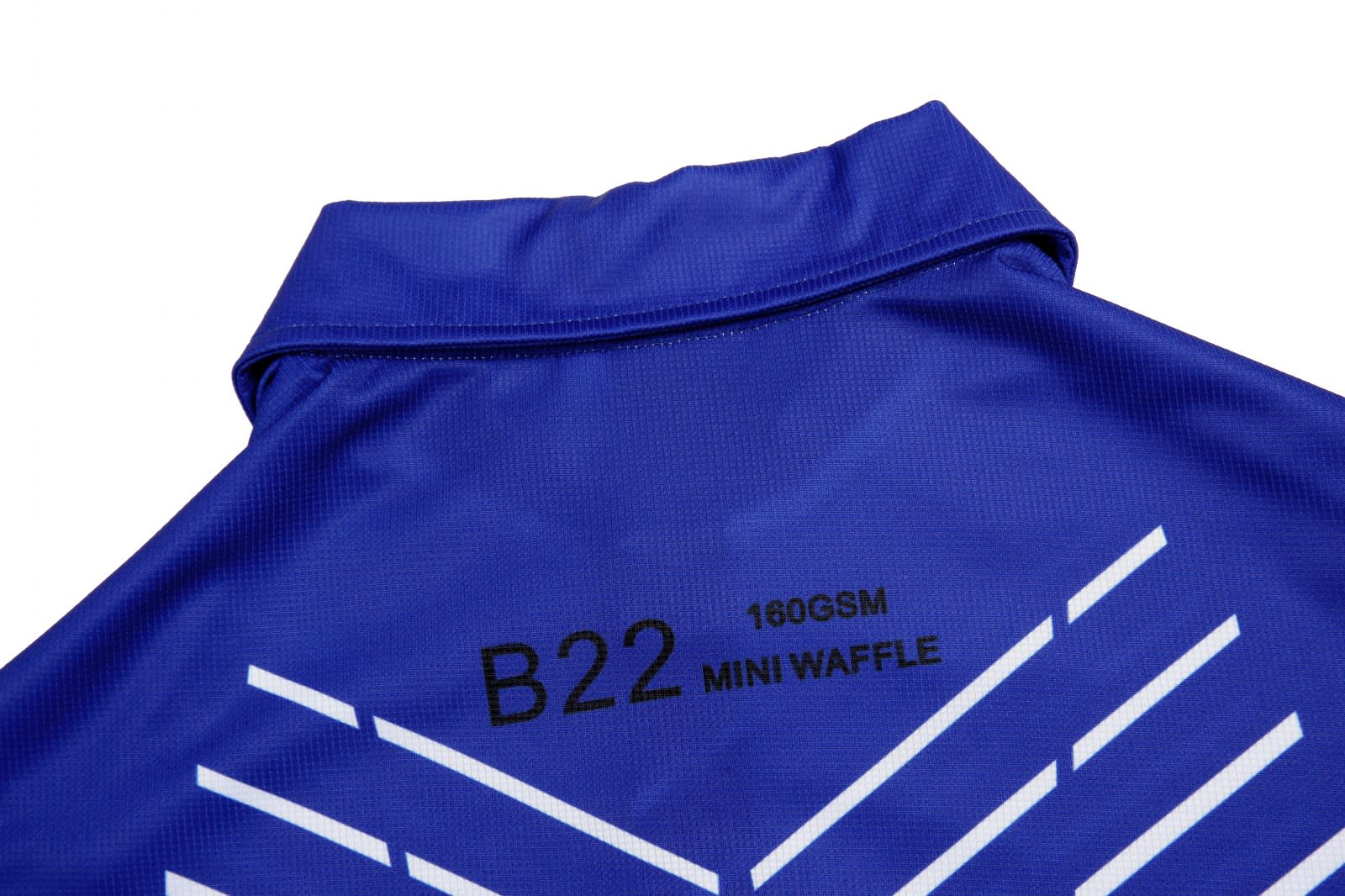 A blue polo shirt featuring a collar and geometric design, with branding on the back.