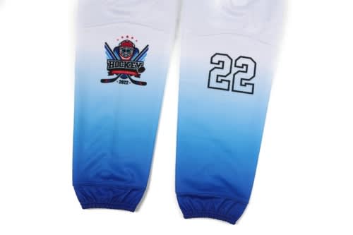 A blue and white ice hockey jersey featuring a logo and the number 22 on the sleeves.