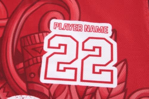 A red basketball uniform jersey featuring a player number "22" and a logo.