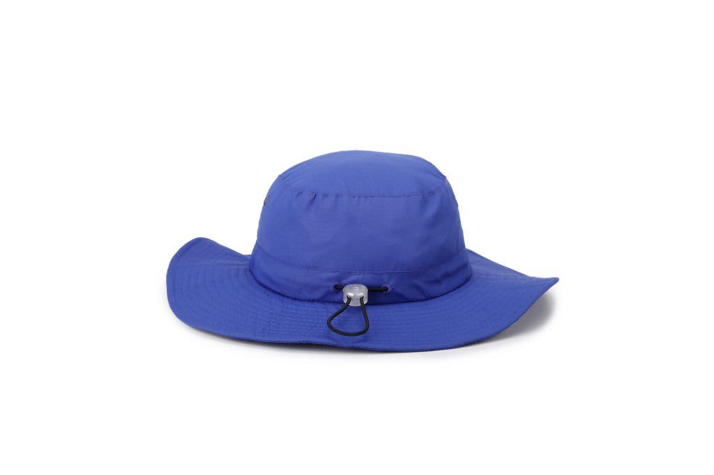 A blue wide brim hat featuring an adjustable strap at the back and a comfortable design.