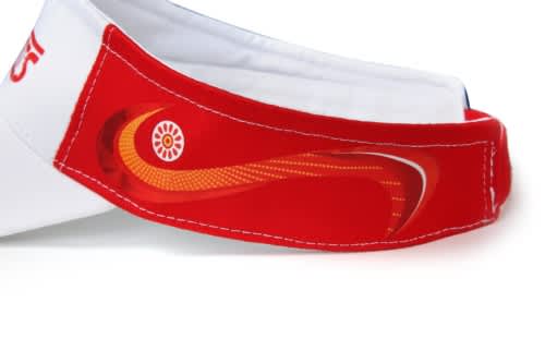 A red and white sublimation visor featuring a curved design and a logo on the band.