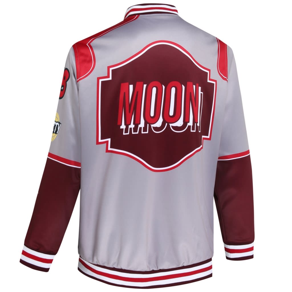 A reversable varsity jacket in grey with maroon accents and a large graphic on the back, featuring a logo.