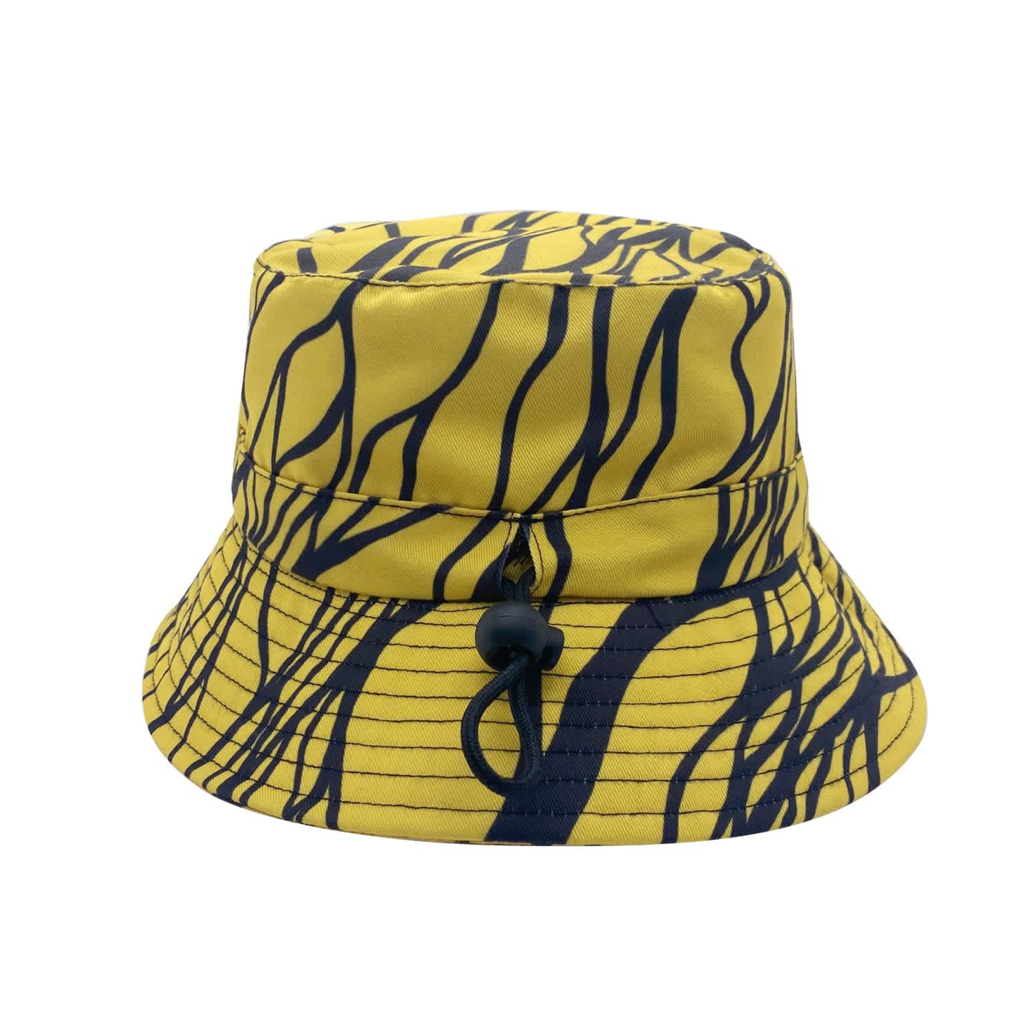 A yellow reversible bucket hat with dark blue abstract lines and a drawstring adjustment feature. It has a logo.