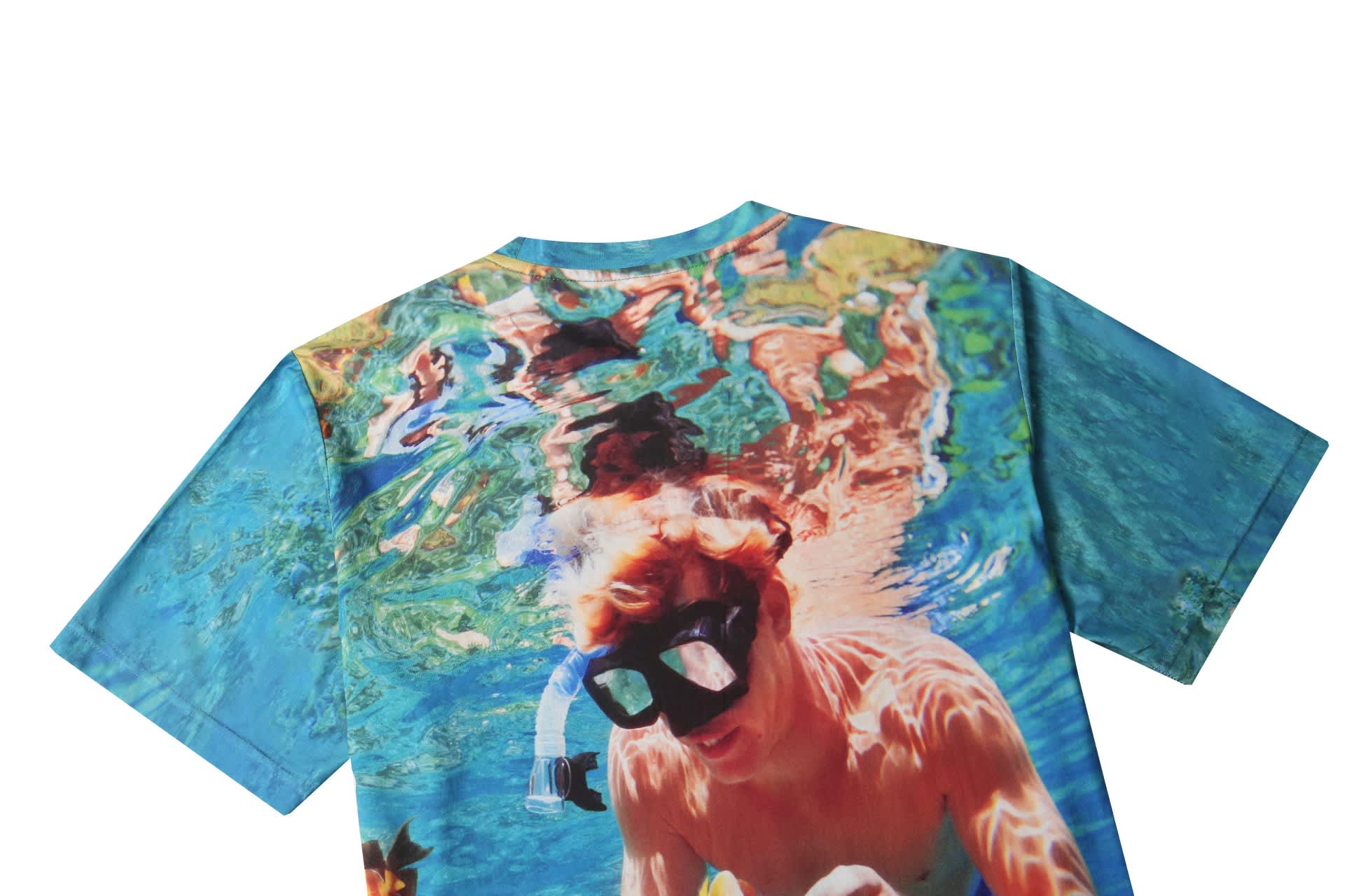 A short-sleeved cotton tee featuring a vibrant blue design with underwater imagery and a logo on the back.
