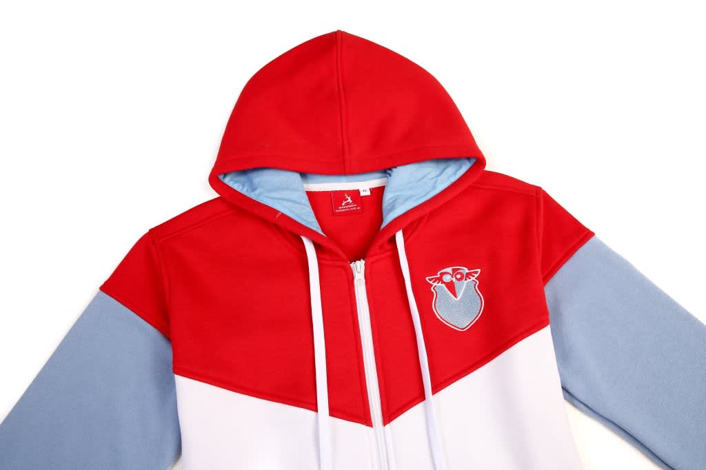 A red and light blue fleece hoodie featuring a hood and a logo on the chest area.