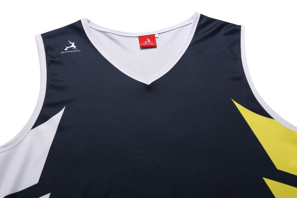 A sleeveless black singlet with white and yellow design elements and a logo on the upper left.
