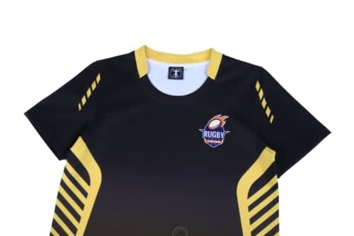 A black and yellow rugby top featuring a logo and bold designs on the sleeves. Perfect for sports uniforms.