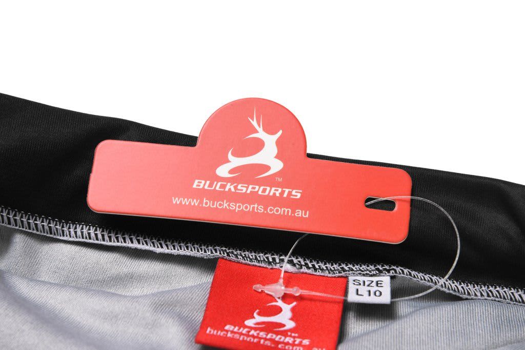 A black and grey sports jersey with a tag showing the brand logo and size label.