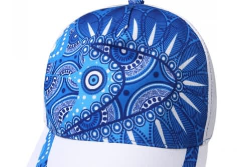 A blue and white sublimated sport cap featuring a decorative geometric pattern and a logo on the side.