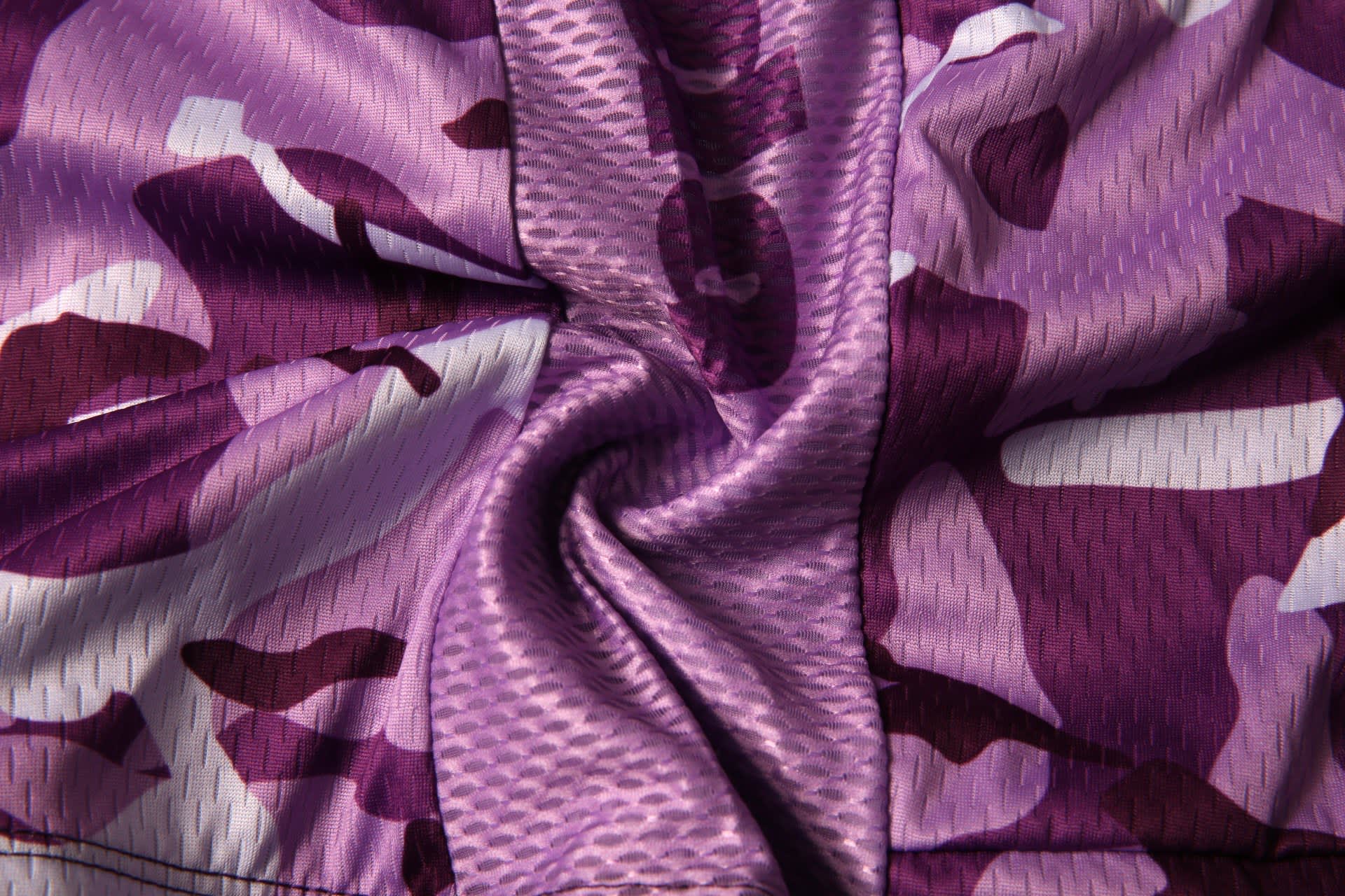 A purple camouflage cycling racing vest made from the latest fabric, featuring a smooth texture and a visible logo.