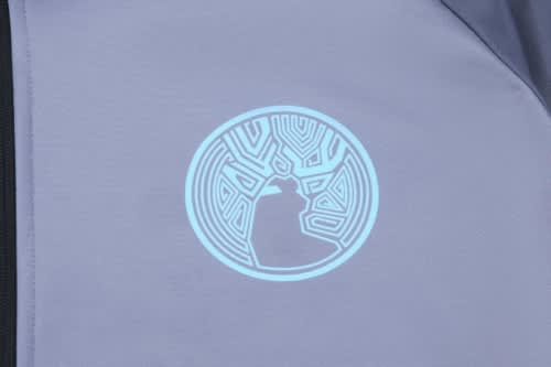 A grey sports jacket featuring a light blue circular logo on the front.