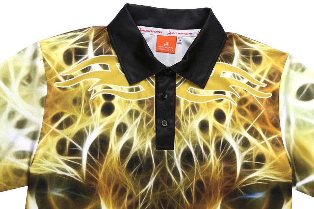 A leopard-print polo shirt featuring a vibrant, gold and black design with a collar and buttons. Includes a logo.