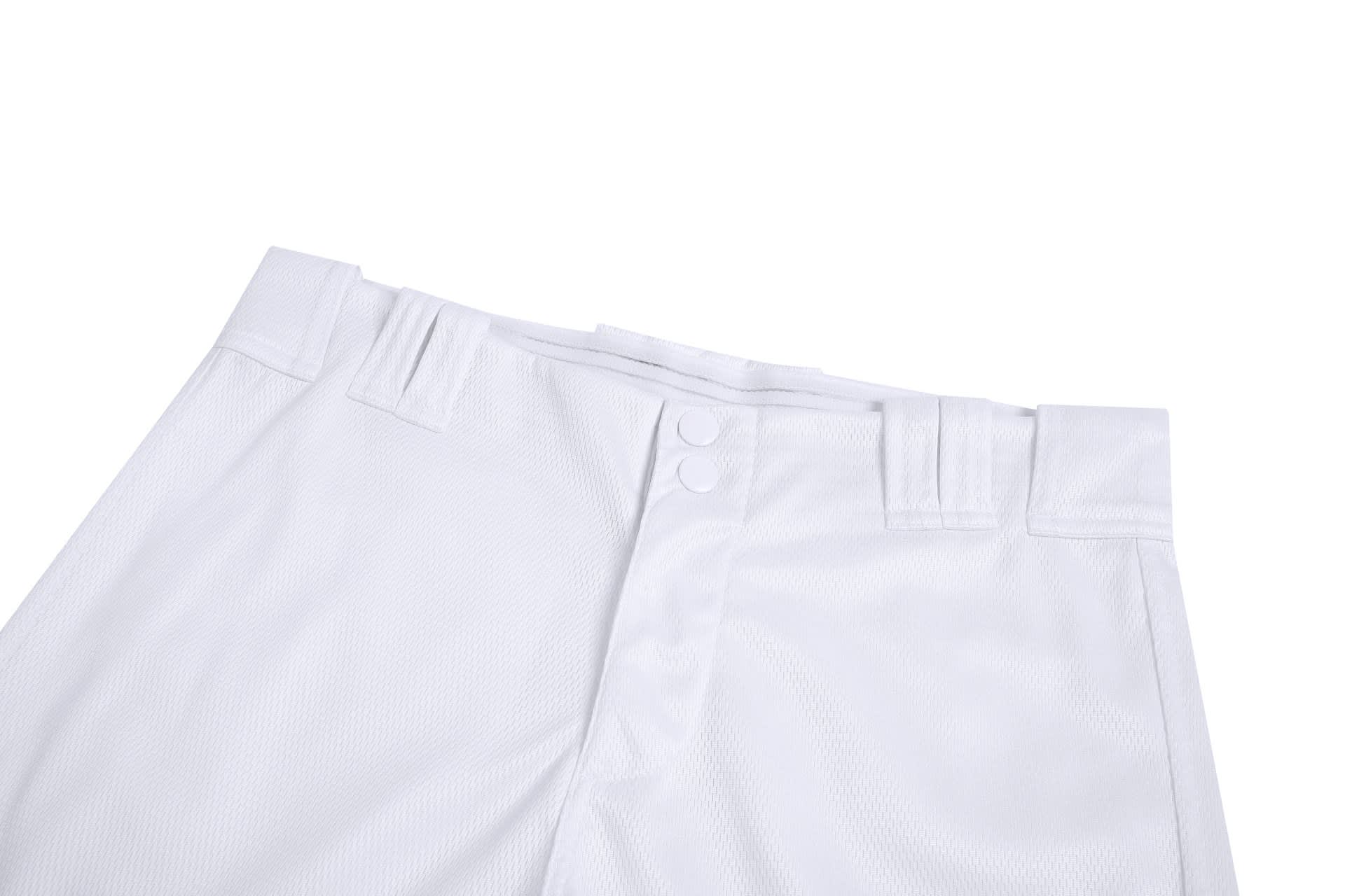 White baseball training pants featuring a button closure and waistband detailing, with a branded logo.
