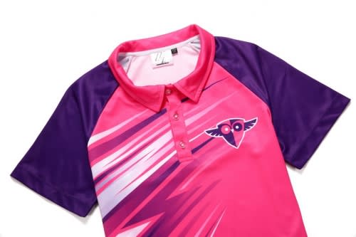 A pink and purple polo shirt featuring a logo, designed for squash club clothing.