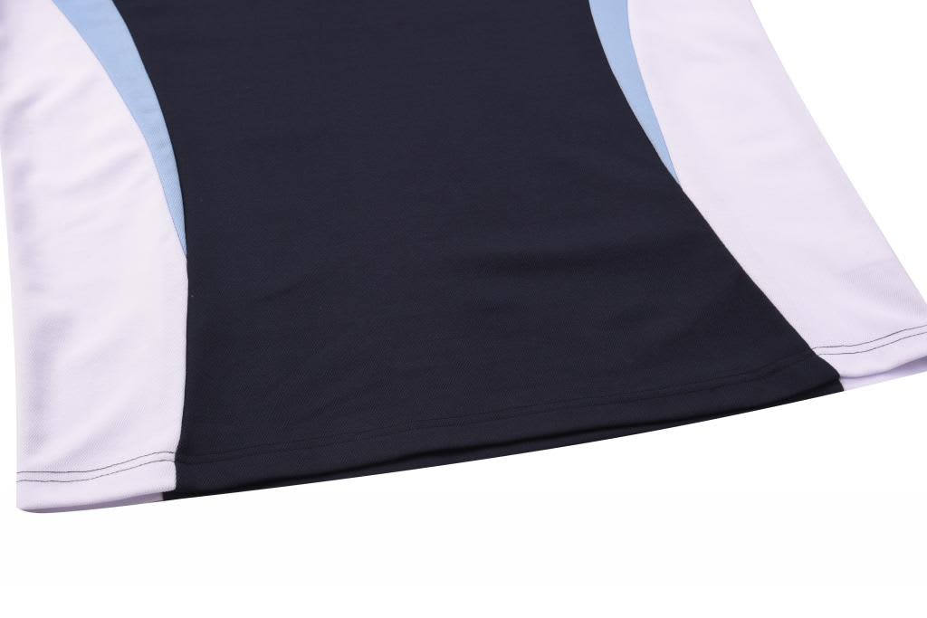 A sublimated shirt with a cotton back featuring black, white, and light blue panels. It has a logo visible.