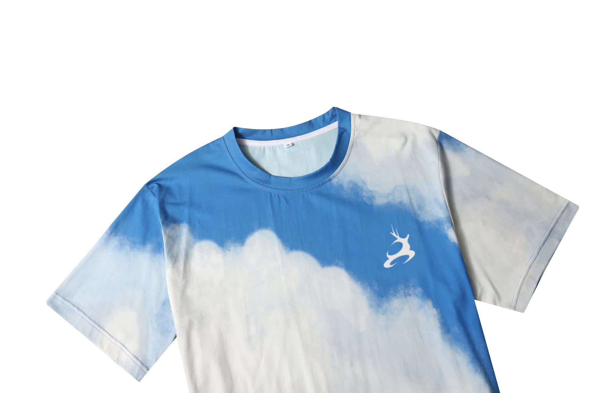 A cotton tee featuring a blue sky design with white clouds and a logo on the front.