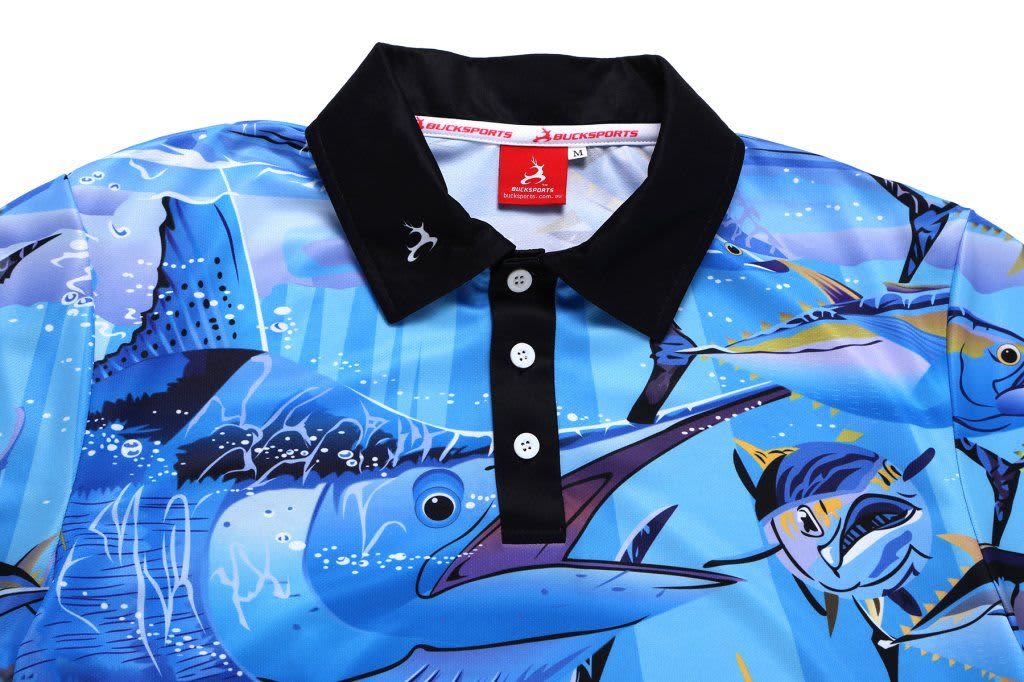 A blue fishing-themed polo shirt featuring various fish designs and a black collar, with a logo on the front.