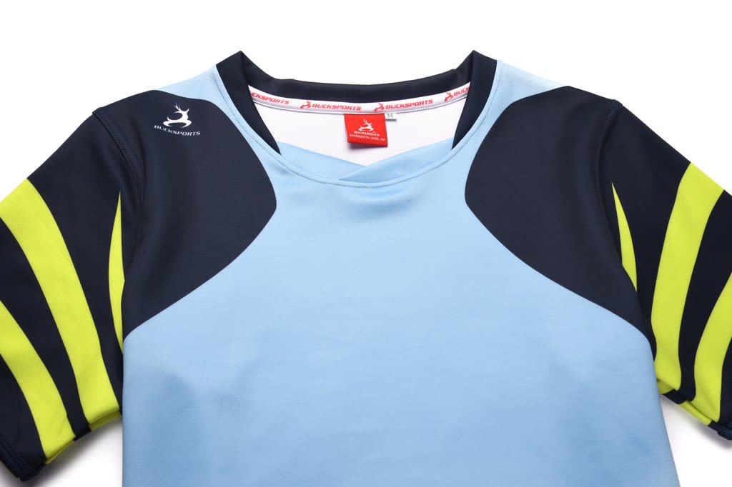 A blue and navy rugby tee with lime green stripes and a logo on the shoulder.