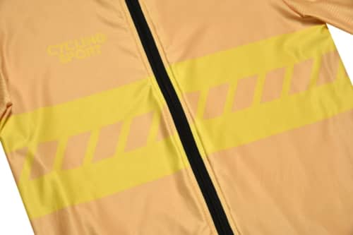 A yellow and peach cycling jersey with a zip, featuring reflective stripes and a logo.