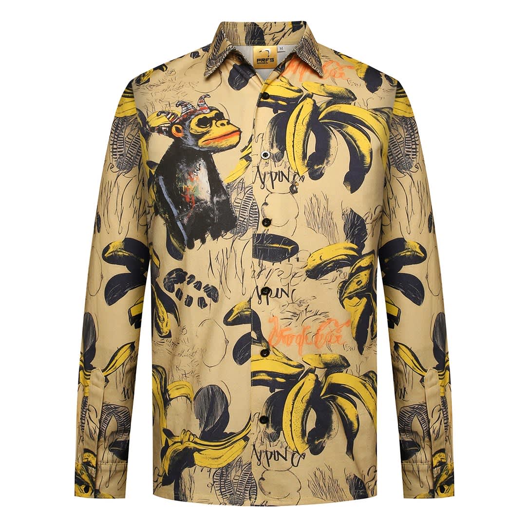 A long-sleeve shirt featuring a vibrant design with yellow bananas and a monkey illustration on a beige background.