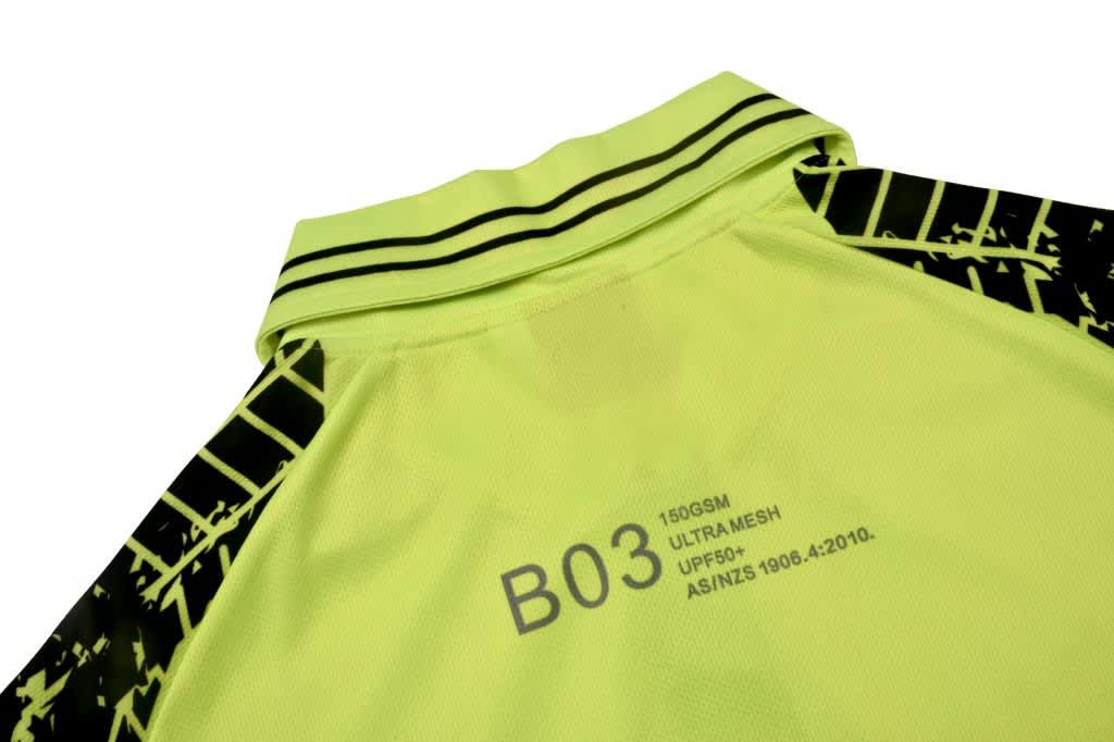 A high-visibility reflective polo shirt in bright yellow, featuring a sporty design and a collar.