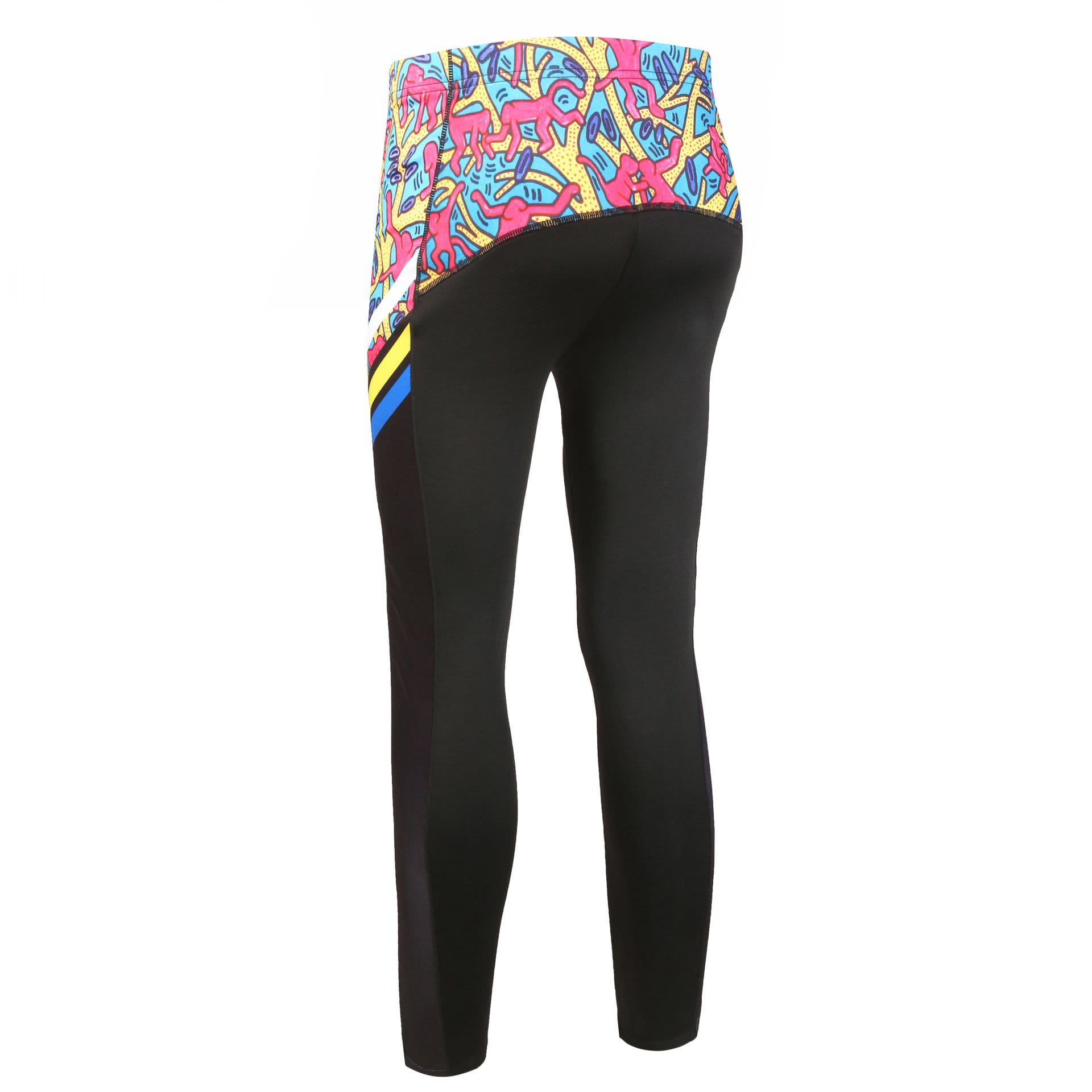 WARM UP PANTS with a multicoloured printed waistband, featuring black leg sections and a branded logo.