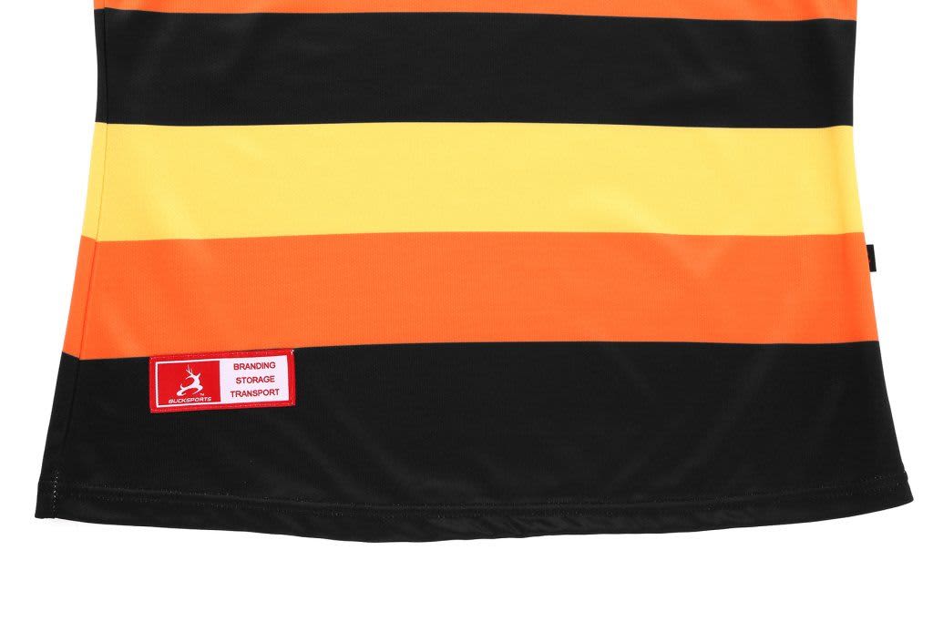 A striped polo shirt featuring orange, yellow, and black colours, with a logo on the side.