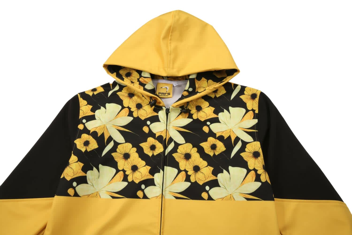 A softshell jacket featuring a yellow and black design with large floral patterns and a hood.