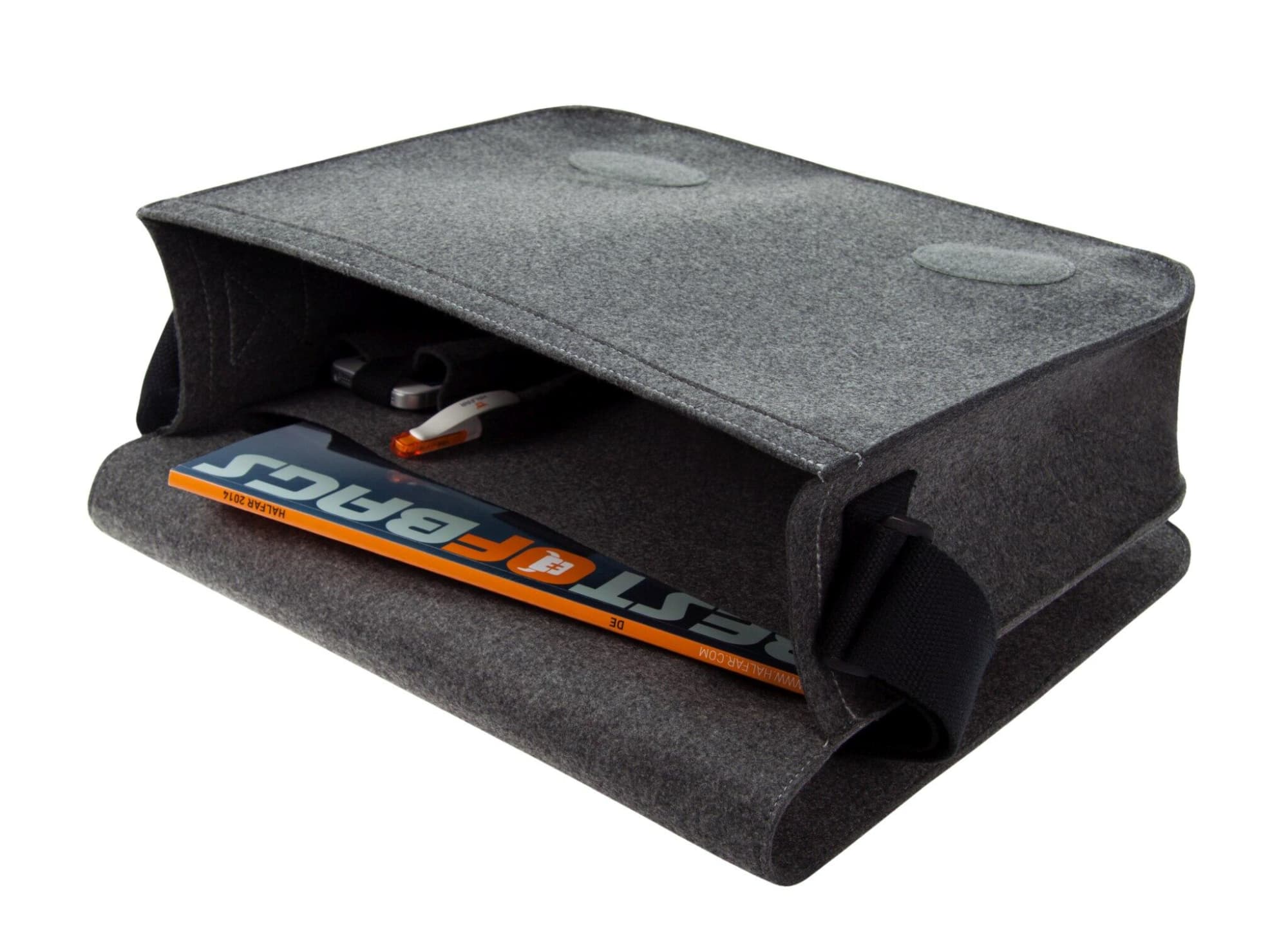 A grey satchel bag with a flap, featuring a smooth exterior and interior compartments for storage.