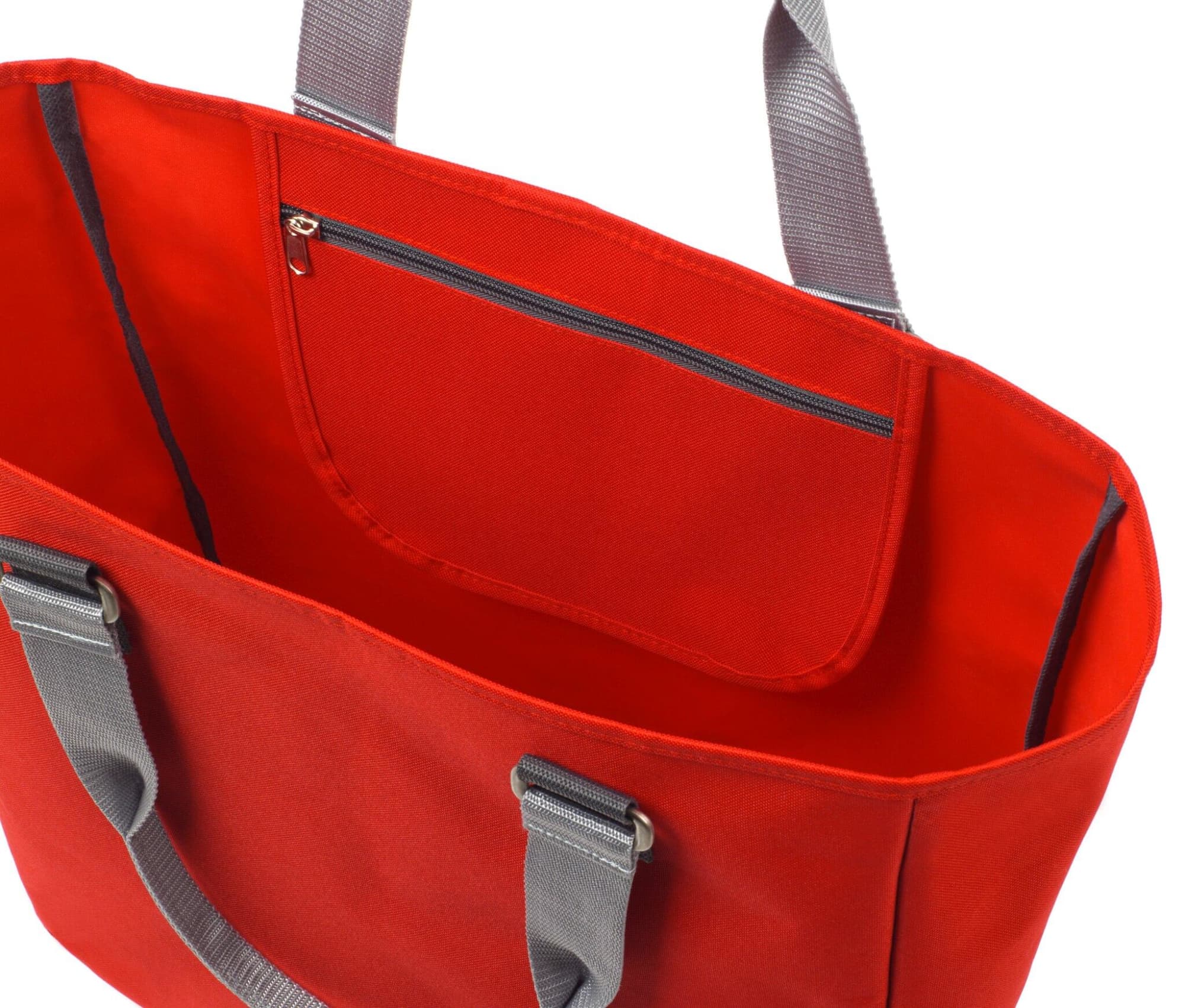 A red reusable grocery bag featuring grey handles and a zippered inner pocket.